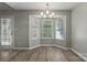 Bright dining area features hardwood floors and a large bay window at 2945 Christian Scott Ln, Charlotte, NC 28214