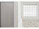 Bright bathroom showcases tiled shower, soaking tub, and window at 3002 Enderbury Dr, Indian Trail, NC 28079