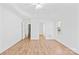 Neutral bedroom featuring a ceiling fan, wood floors, and a closet at 3002 Enderbury Dr, Indian Trail, NC 28079