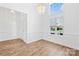 Bright dining area with wood floors and large window at 3002 Enderbury Dr, Indian Trail, NC 28079
