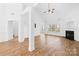 Bright and airy living room with wood floors, fireplace, and lots of light at 3002 Enderbury Dr, Indian Trail, NC 28079
