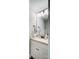Cozy bathroom featuring marble countertops, white cabinets, and a bronze-toned vanity mirror at 3018 Corinth Church Rd, Monroe, NC 28112
