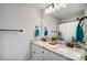Bathroom featuring double sinks, granite countertops, vanity, and a big mirror at 3018 Corinth Church Rd, Monroe, NC 28112