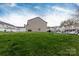 Exterior view of the back of the home and the backyard at 3138 Golden Dale Ln, Charlotte, NC 28262