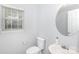 Cozy half bathroom featuring a modern vanity and fixtures at 3138 Golden Dale Ln, Charlotte, NC 28262