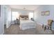 Serene bedroom with soft lighting, neutral tones, and comfortable decor at 3138 Golden Dale Ln, Charlotte, NC 28262