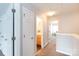 Upstairs hallway with access to bathroom, bedrooms, and closets at 3138 Golden Dale Ln, Charlotte, NC 28262