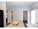 Bright, open kitchen area features an island counter top, doorway access and sliding door access at 3138 Golden Dale Ln, Charlotte, NC 28262