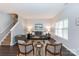 Comfortable living room with modern gray tones and a large window at 3138 Golden Dale Ln, Charlotte, NC 28262
