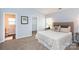 Comfortable main bedroom with a walk in closet and adjoining bathroom at 3138 Golden Dale Ln, Charlotte, NC 28262