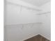 Walk-in closet with installed shelving and carpet at 3138 Golden Dale Ln, Charlotte, NC 28262
