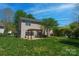 Backyard featuring a patio and a well-manicured lawn with privacy fence at 3712 Autumn Gold Ct, Charlotte, NC 28278