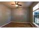 Bright, minimalist bedroom with wood floors and a window offering natural light at 3712 Autumn Gold Ct, Charlotte, NC 28278
