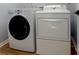 Functional laundry area with a modern washer and dryer at 3712 Autumn Gold Ct, Charlotte, NC 28278