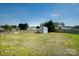 Expansive backyard with a storage shed and wooden fence offers ample space for outdoor activities and relaxation at 4002 Shadow Pines Cir, Indian Trail, NC 28079