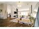 Open concept living space with hardwood floors, plenty of light, and a modern aesthetic at 4002 Shadow Pines Cir, Indian Trail, NC 28079