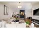Bright living room with modern decor, vaulted ceilings, and an open floor plan for entertaining at 4002 Shadow Pines Cir, Indian Trail, NC 28079