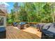 Expansive wooden deck perfect for entertaining with ample seating and barbecue area overlooking lush greenery at 4058 Canvas Ave, Rock Hill, SC 29732