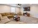 Cozy living room with plush seating, ceiling fan, and mounted television creating a relaxing atmosphere at 4058 Canvas Ave, Rock Hill, SC 29732