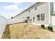 Spacious backyard with a white fence, concrete patio, and green surroundings at 4112 Steel Way, Sherrills Ford, NC 28673