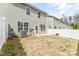 Large backyard featuring a patio, a white privacy fence, and green surroundings at 4112 Steel Way, Sherrills Ford, NC 28673