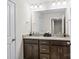 Bathroom features double sinks, granite countertops, and modern fixtures at 4112 Steel Way, Sherrills Ford, NC 28673