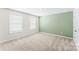 Well-lit bedroom with large windows and neutral-colored walls at 4112 Steel Way, Sherrills Ford, NC 28673