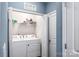 Functional laundry room with appliances and storage shelves at 4112 Steel Way, Sherrills Ford, NC 28673