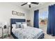 Bedroom with a plush bed, cozy carpet, and ample natural light, creating a serene and inviting space at 4427 Bright Rd, Charlotte, NC 28214