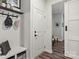 Inviting entryway with a bench, coat rack, and stylish decor, creating a welcoming ambiance at 4427 Bright Rd, Charlotte, NC 28214
