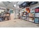 Garage featuring sealed concrete flooring, storage shelves, and a utility closet at 4427 Bright Rd, Charlotte, NC 28214