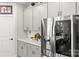 New stainless steel LG fridge and freezer combo, white countertops, and white cabinets at 4427 Bright Rd, Charlotte, NC 28214