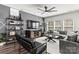 Contemporary living room with chic decor, a large TV, and plenty of natural light at 4427 Bright Rd, Charlotte, NC 28214