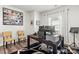 Functional home office setup with a spacious desk, multiple monitors, and natural light at 4427 Bright Rd, Charlotte, NC 28214