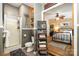 Bathroom featuring a glass door shower, updated fixtures, and open views of the bedroom area at 4478 Fork Rd, Norwood, NC 28128