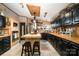 Beautiful kitchen with wood countertops, black cabinets, and modern appliances at 4478 Fork Rd, Norwood, NC 28128