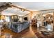 Spacious living room with stone fireplace, wood accents, and plenty of natural light at 4478 Fork Rd, Norwood, NC 28128