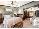 Cozy bedroom with a comfortable bed, neutral tones, and access to another room, offering a serene escape at 4478 Fork Rd, Norwood, NC 28128