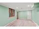 Finished basement with recessed lighting, wood-look flooring, and light green walls offers flexible living space at 469 Augusta Dr, Statesville, NC 28625