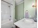 Bathroom featuring updated shower over tub, vanity, and fixtures at 469 Augusta Dr, Statesville, NC 28625