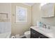 Bright bathroom with a modern vanity, tile accents, and recessed lighting at 469 Augusta Dr, Statesville, NC 28625