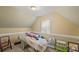 Cozy bedroom with neutral walls, white trim and a single window for natural light at 469 Augusta Dr, Statesville, NC 28625