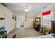 Cozy bedroom with a ceiling fan, closet, neutral carpet, and an ensuite bathroom at 469 Augusta Dr, Statesville, NC 28625