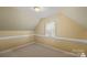 Cozy bedroom with neutral walls, white trim and a single window for natural light at 469 Augusta Dr, Statesville, NC 28625