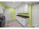 Large flex room featuring white cabinets, shelving, and counter space for storage and organization at 469 Augusta Dr, Statesville, NC 28625