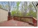 Cozy back deck overlooking a wooded lot with new spring growth at 485 Camrose Ne Cir, Concord, NC 28025