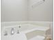 An inviting bathroom featuring a garden tub with a silver faucet at 6020 Running Deer Rd, Charlotte, NC 28214