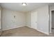 Bedroom with neutral walls, window, and closet at 6020 Running Deer Rd, Charlotte, NC 28214