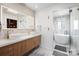 Beautiful bathroom with double sinks, walk in shower, and a soaking tub at 6147 Lake Providence Ln, Charlotte, NC 28277