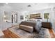 Primary bedroom with a sitting area and a walk-in closet at 6147 Lake Providence Ln, Charlotte, NC 28277
